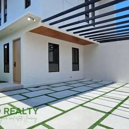 Contemporary facade and carport