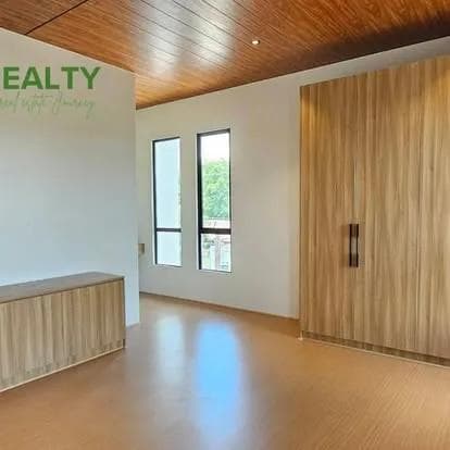 Living space with warm wood finishes